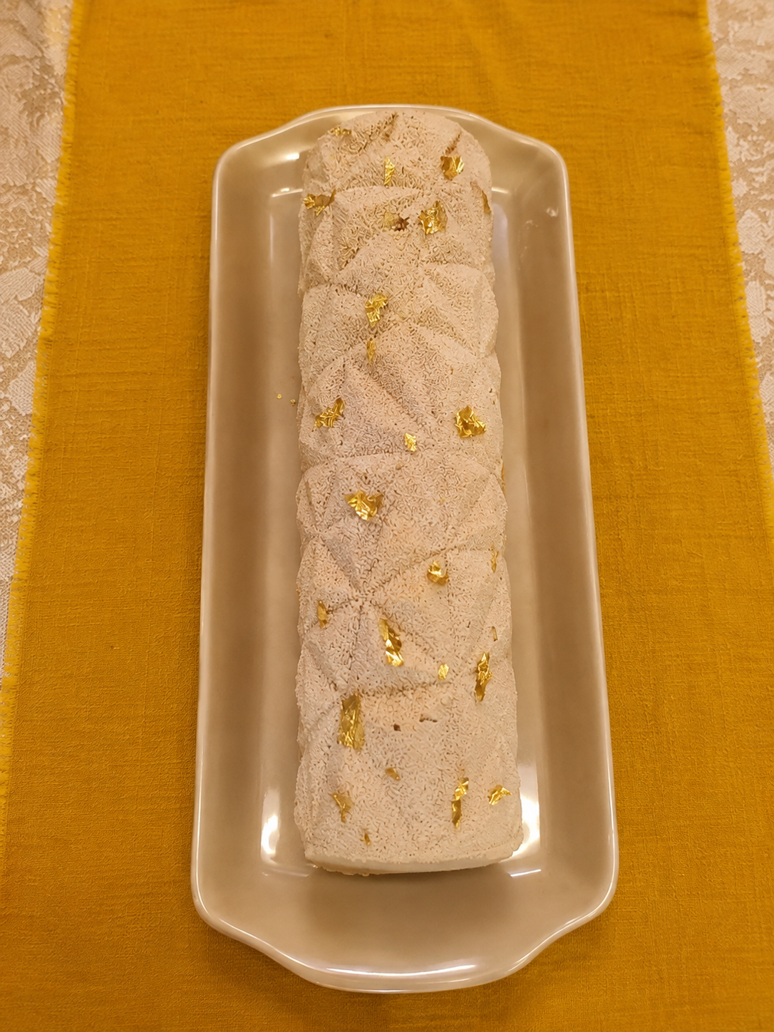 Bûche de Noël au praliné noisette Plaisirs Pralinés